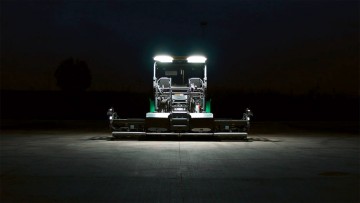 A Dash 5 paver with LED spotlights switched on in the dark 